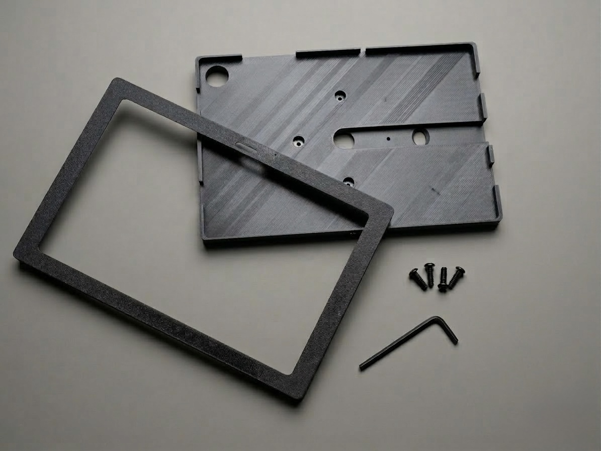 SlateSafe tablet enclosure components: backplate, bezel, and assembly hardware